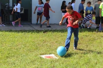 Boy kicking a ball