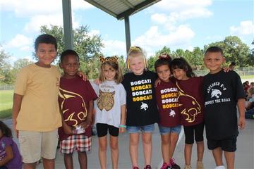 Boys and Girls standing together for a group photo