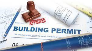 Building permit with APPROVED stamped on it