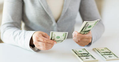 person counting money