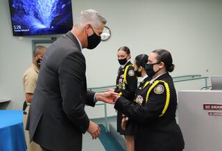 Superintendent awarding cadet