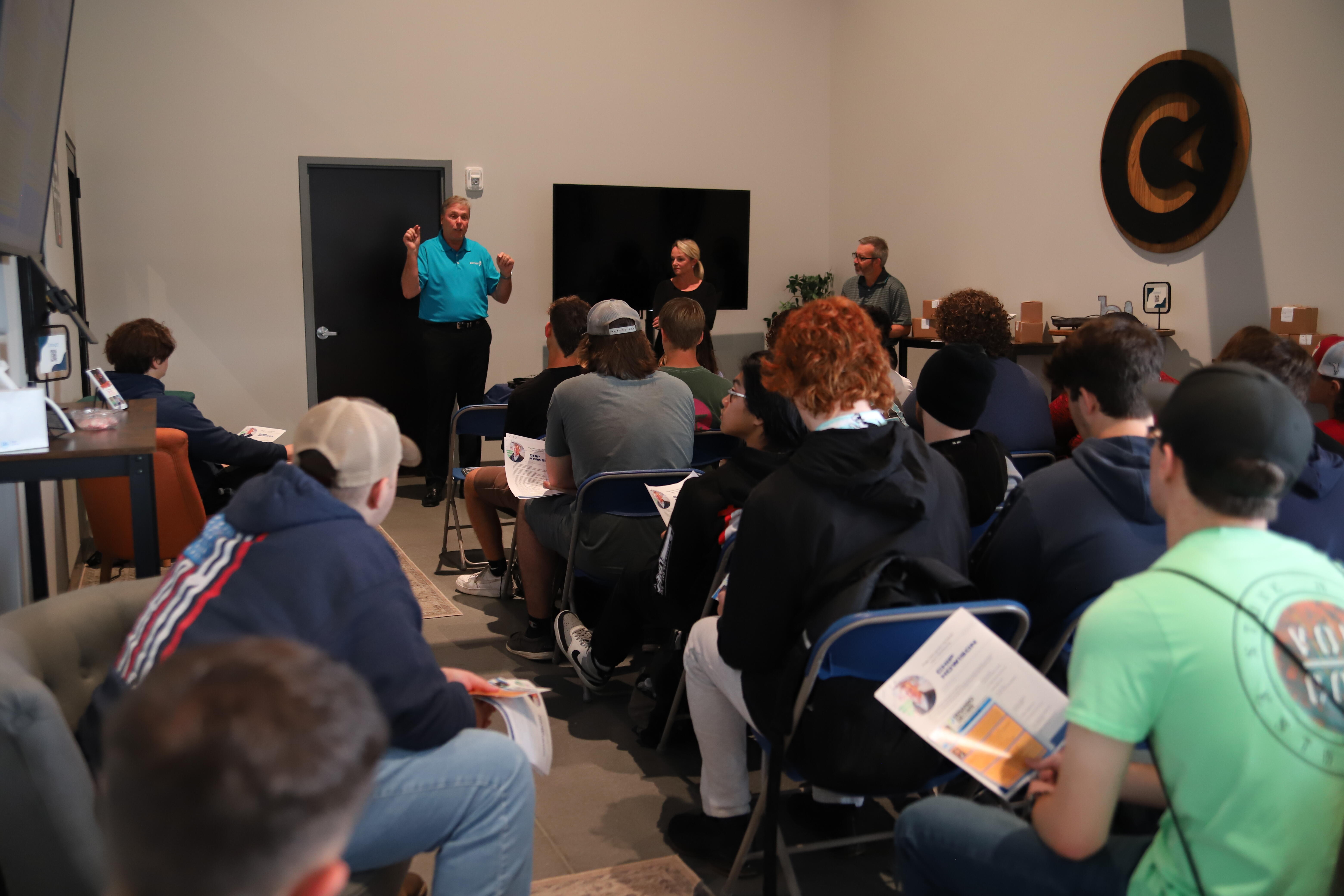 Staff addressing students at the Hernando Grown event