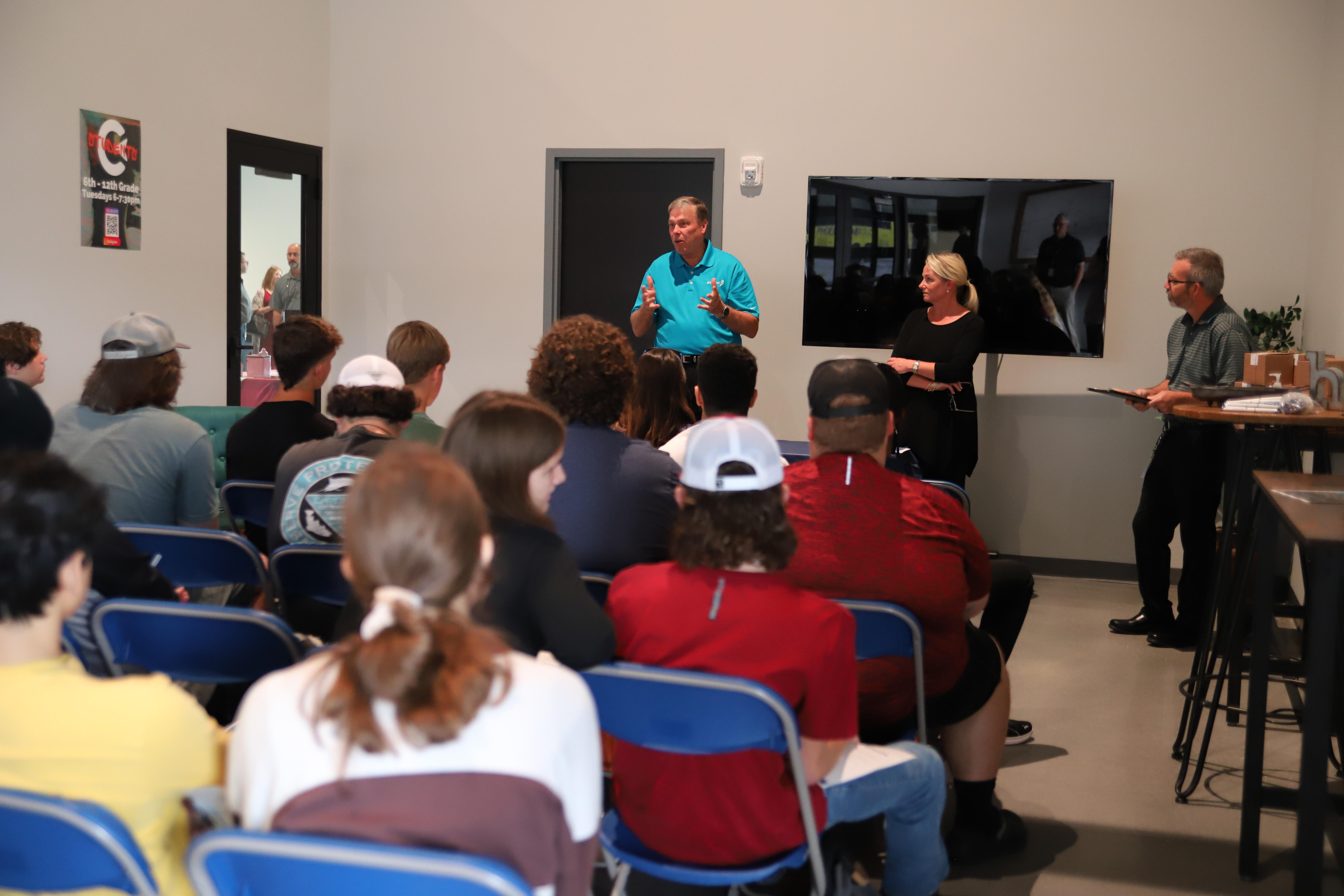 Staff addressing students at the Hernando Grown event