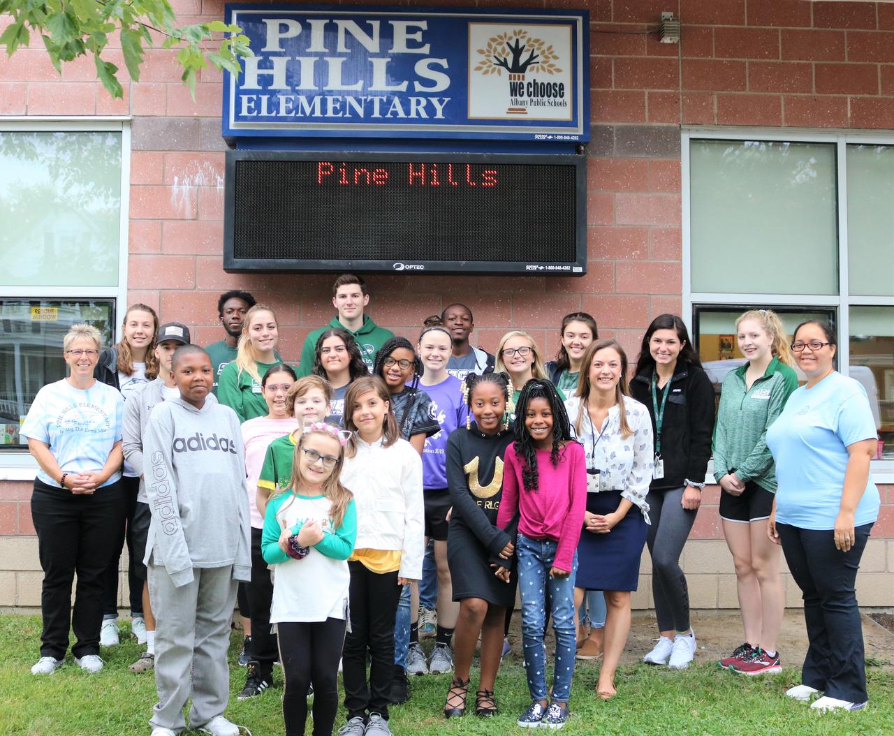 Sage Athletics donates supplies Pine Hills Elementary School