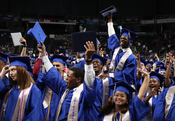 Graduates celebrate at ʿ High's 2019 commencement ceremony