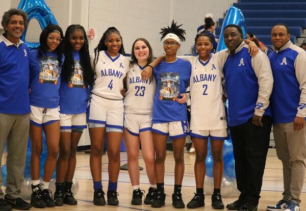 The girls' basketball team poses before a game against South Colonie.