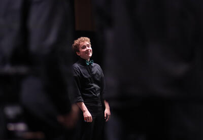 Singer Ray Blanken performs a solo onstage