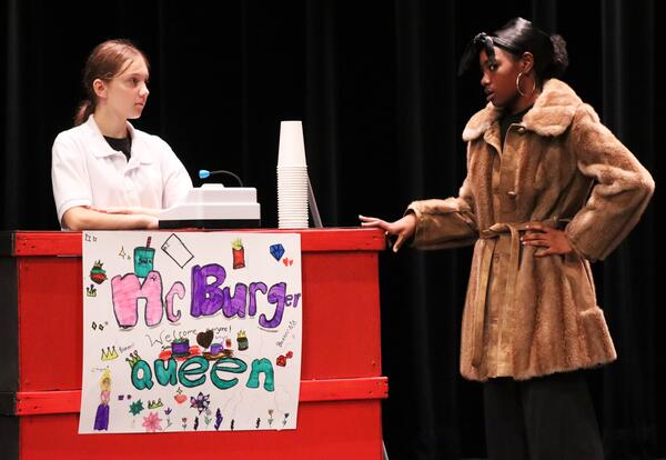 Two students performing a scene from "To Be Or Not To Be"