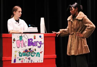 Two students performing a scene from "To Be Or Not To Be"