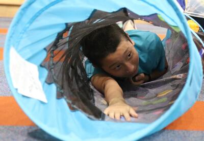 A student participates in adaptive PE.