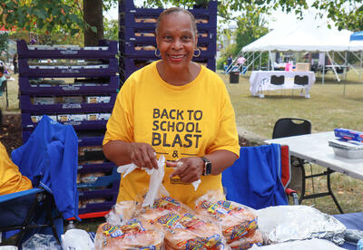  outreach member serves up burgers