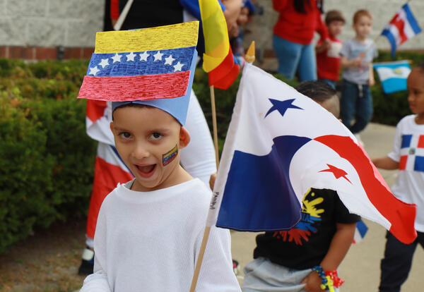 Smiling child wearing h