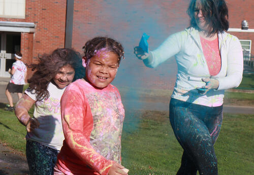 Students get blasted with color as they run
