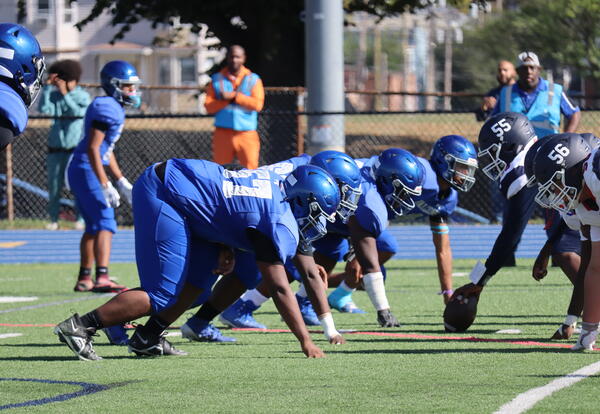 Photo of Albany High football players on the turf