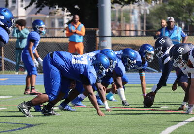 Photo of Albany High football players on the turf