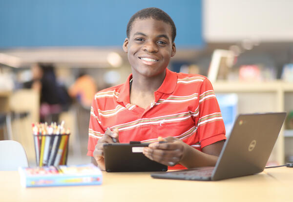 Student working in the library
