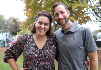 Two teachers pose on the playground before heading to the NYC marathon.