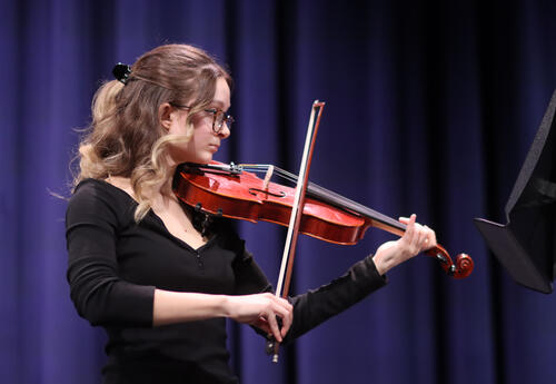 Student playing the violin