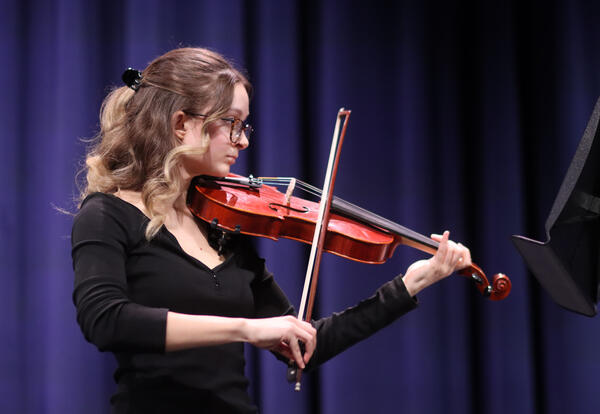 Student playing the violin