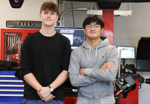 Photo of Judson Hardage and Josh Ira Alpas in the Albany High automotive shop