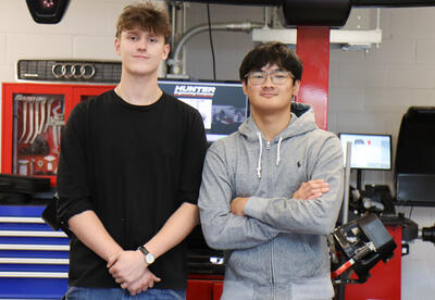 Photo of Judson Hardage and Josh Ira Alpas in the Albany High automotive shop