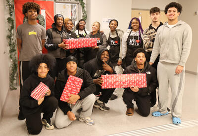 Group photo of barbering and cosmetology students