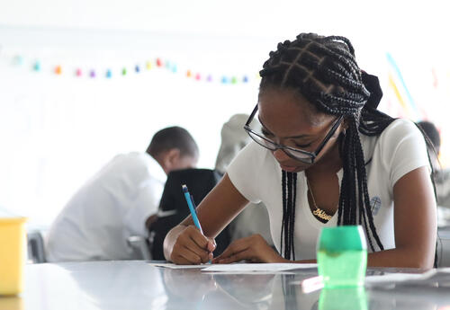 Student in art class