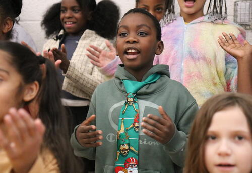 The chorus performs their winter concert for peers.
