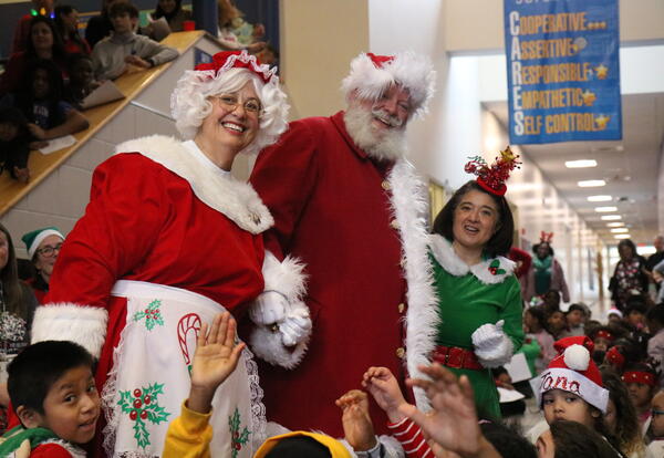 Santa and Mrs. Claus pop in to celebrate the last day of school before winter break.