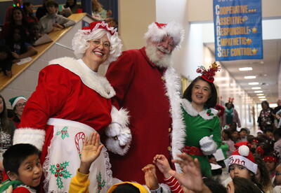 Santa and Mrs. Claus pop in to celebrate the last day of school before winter break.