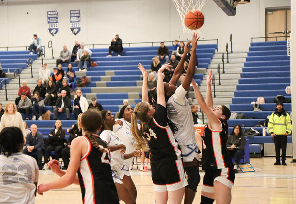 Photograph of the girls' team in action against Bethlehem