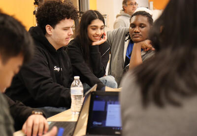 Students collaborating together during day-long brainstorming session