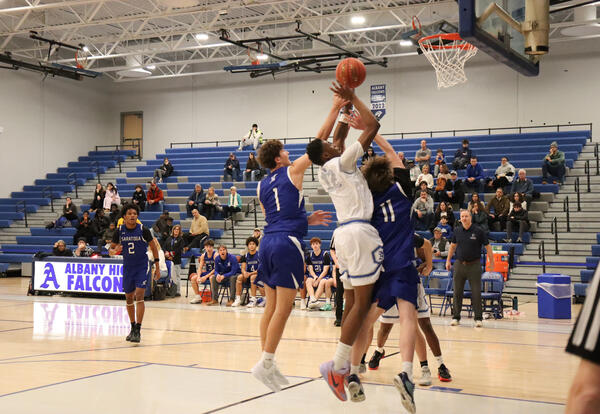 Albany High player taking a 2-point shot