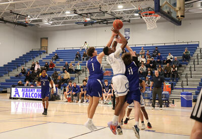 Albany High player taking a 2-point shot