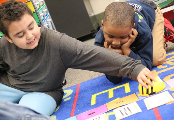 Students program robotic bees to practice math.