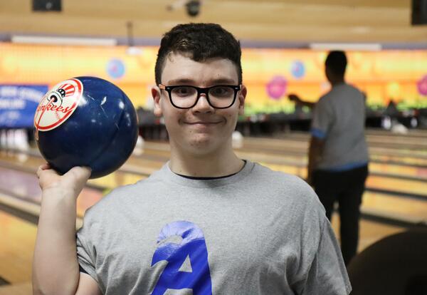 Albany High student playing unified bowling