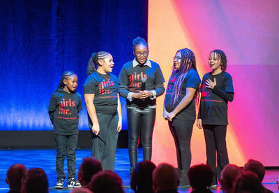 Five students lead the Pledge of Allegiance at Governor Hochul's State of the State address.