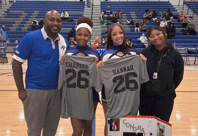 Cheerleading seniors posing for a group photo