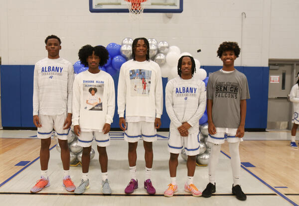 Basketball seniors posing for a group photo
