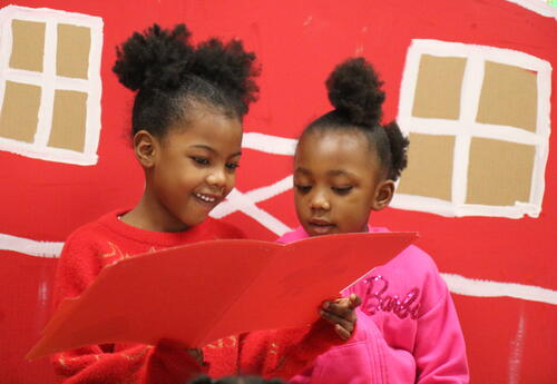 Two students share a project about farm animals.