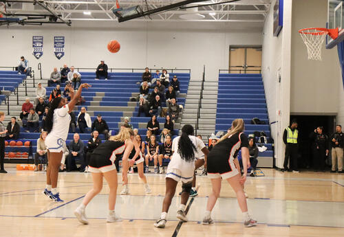 Albany High girls' basketball player shooting a free throw