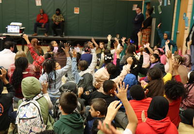 Students raising their hands