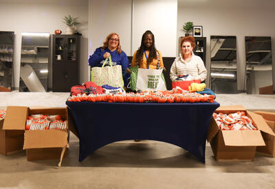 Albany High staff with donations in the Falcon Market