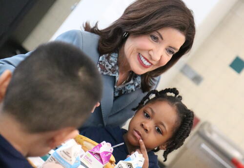 Governor Hochul enjoys a meal in the ASH cafeteria with students.