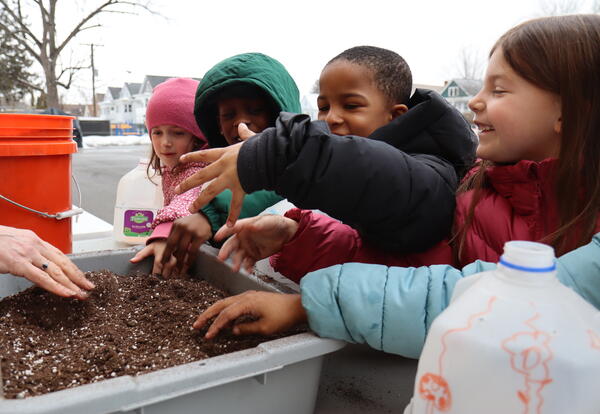 students playing with soil