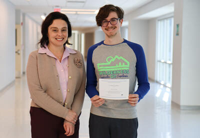 Principal Jodi Commerford with Kalias Bouget