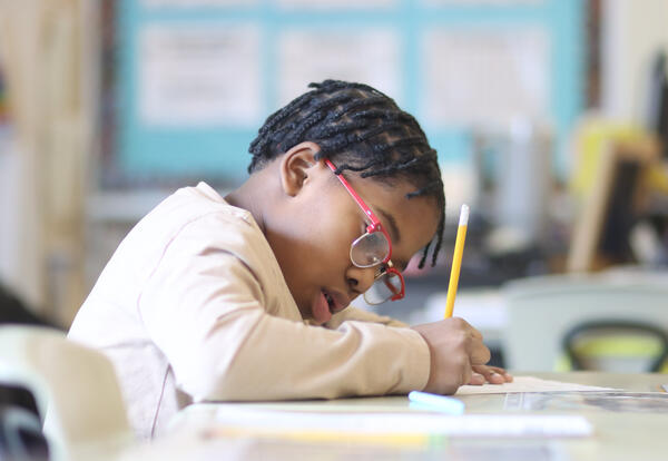 Student working on a writing assignment