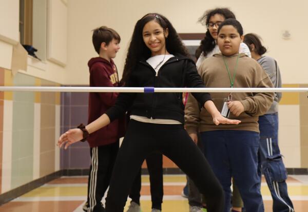 Students play the limbo game at a No Referral Celebration.