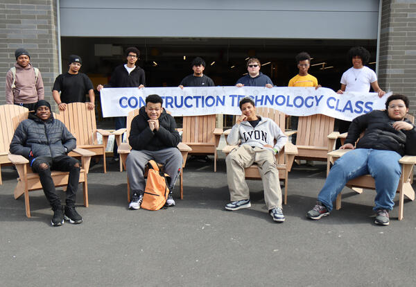 Students with Adirondack chairs