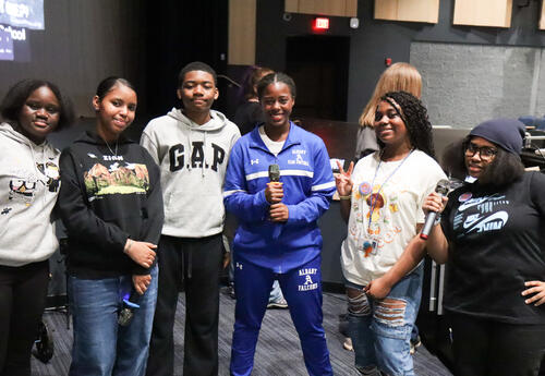 Group of students posing after singing karoke
